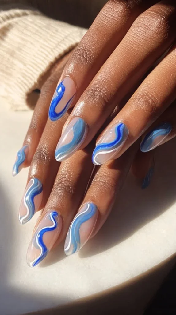 Showcasing 27 tropical-inspired blue nail ideas for stylish manicures.