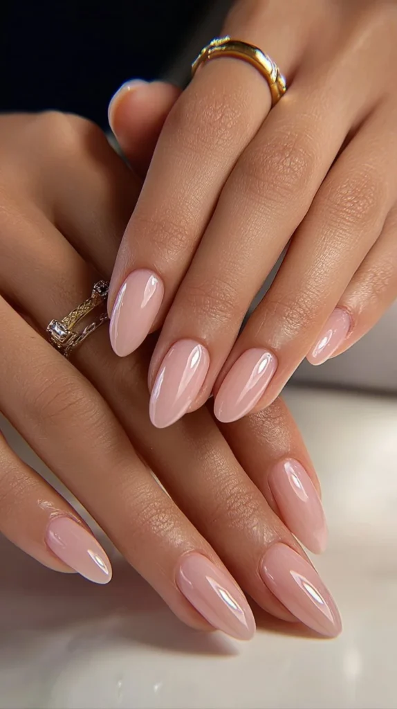Elegant almond nails featuring classic designs and polished finishes.