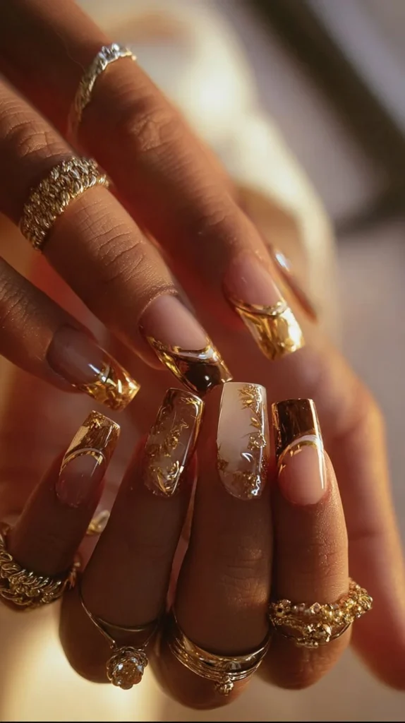 Beautiful warm-toned acrylic nails with a trendy tortoise design by nail artists.