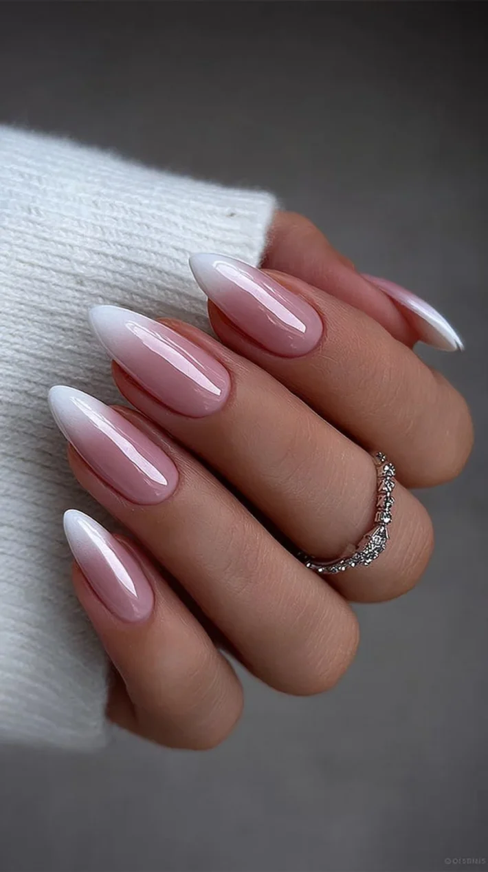 Elegant almond shaped French nails design for a stunning manicure inspiration