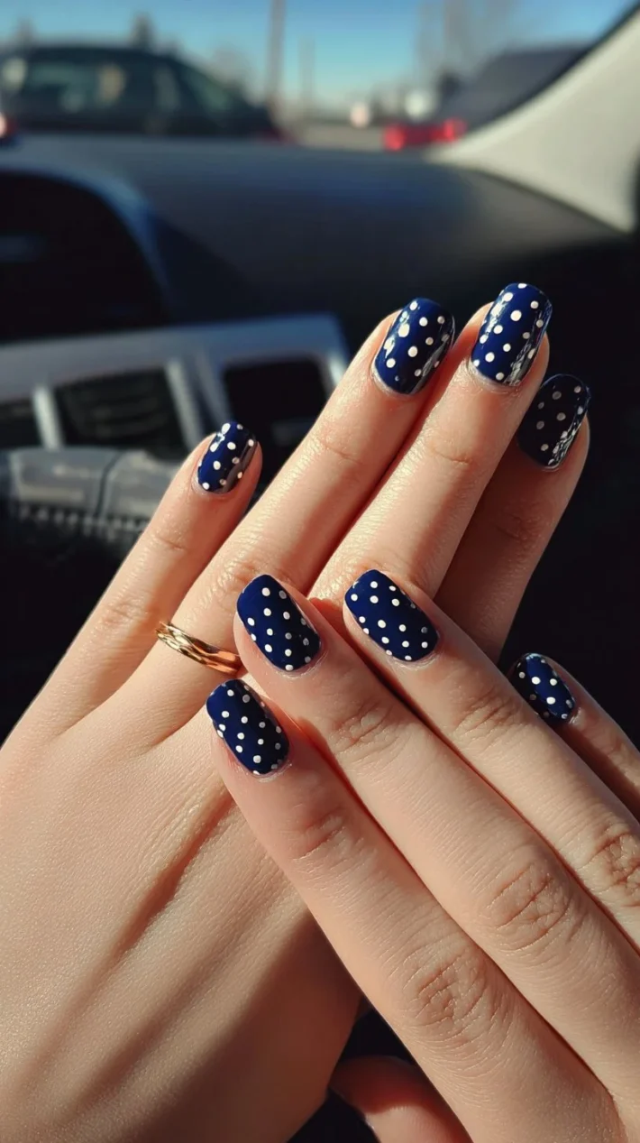 Elegant navy blue polka dot press on nails for a stylish manicure