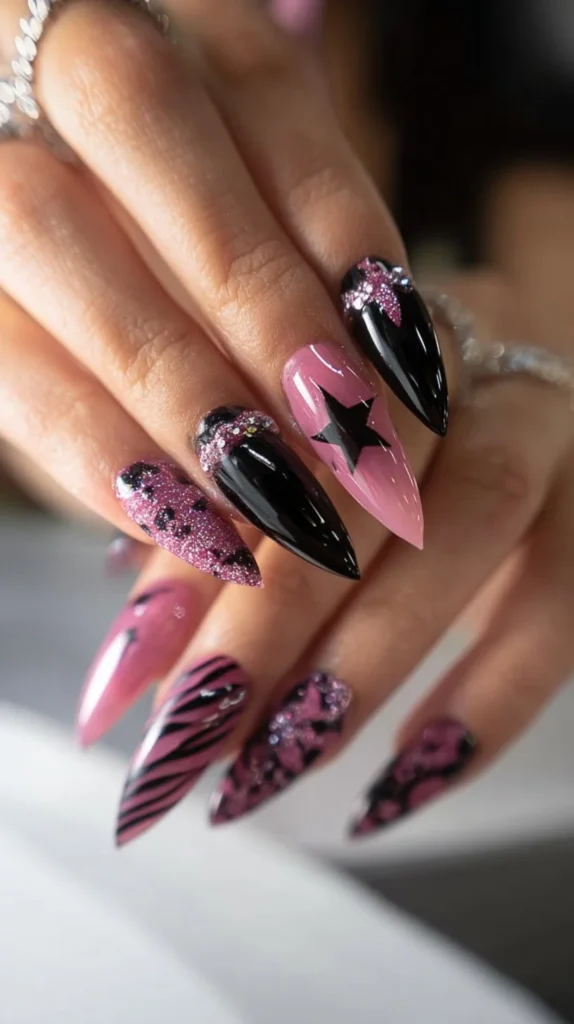 Stylish pink nails with zebra print and star designs for a trendy look
