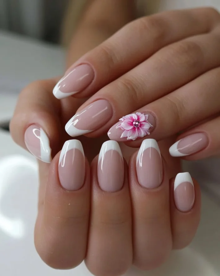 Pink floral French tip press on nails design for elegant nail art.