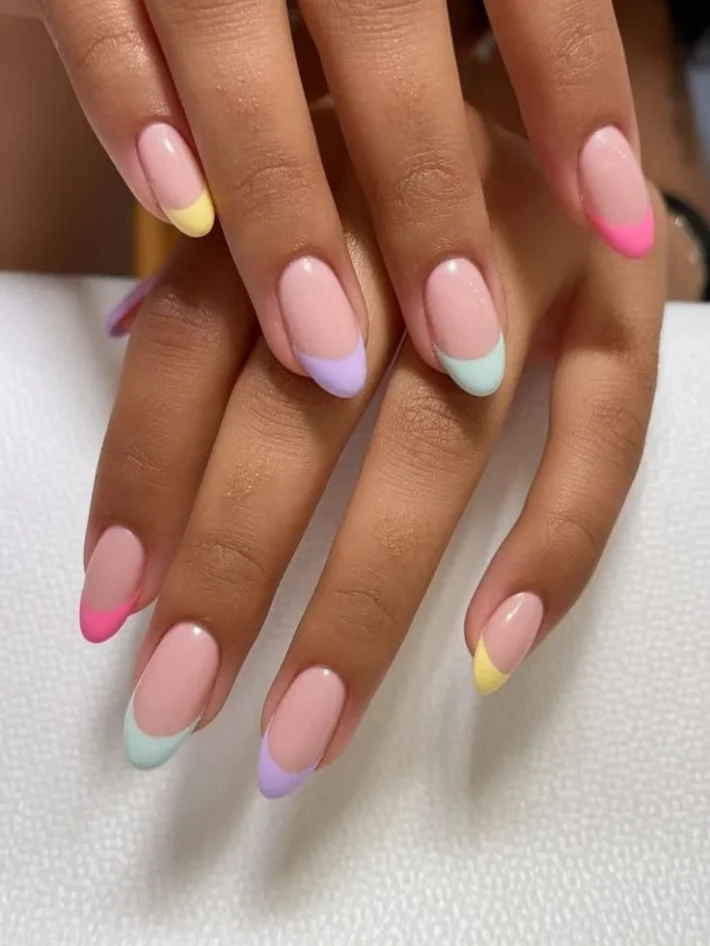 Pastel ombre French tip nails for Spring 2025 showcasing trendy nail designs.