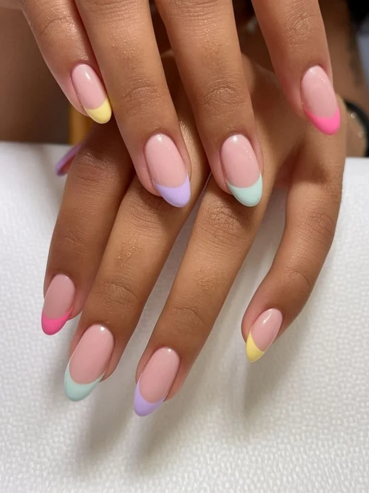 Pastel ombre French tip nails for Spring 2025 showcasing trendy nail designs.